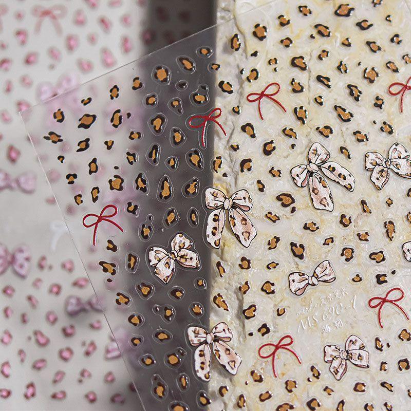 

Leopard Bow Nail Sticker Tomoni Back Glue Thin Tough 3D Best Selling Ins Sexy Nail Sticker Decorations Brown leopard print Bows 690-1((Thin and tough))