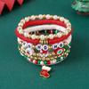 Kerst sieraden over de grens: Set Armbanden met Kralen van Polymeerklei en Imitatieparels met Hanger van Kerstman & Rendier
