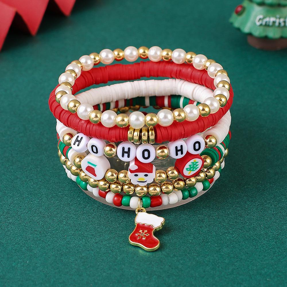 Kerst sieraden over de grens: Set Armbanden met Kralen van Polymeerklei en Imitatieparels met Hanger van Kerstman & Rendier