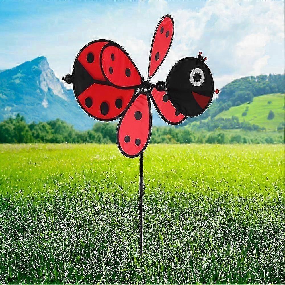 Dekorace na zahradní párty se 3D hmyzím větrníkem
