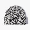 Winter outdoor knitted hat European and American fashion jacquard men's and women's brimless warm leopard print cold hat thickened ear protector wool