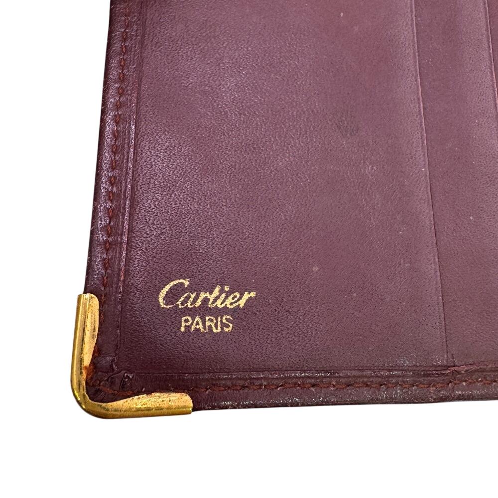Cartier Ražené logo kožená peněženka Must Line Bifold Červená kůže Dámská Použitá