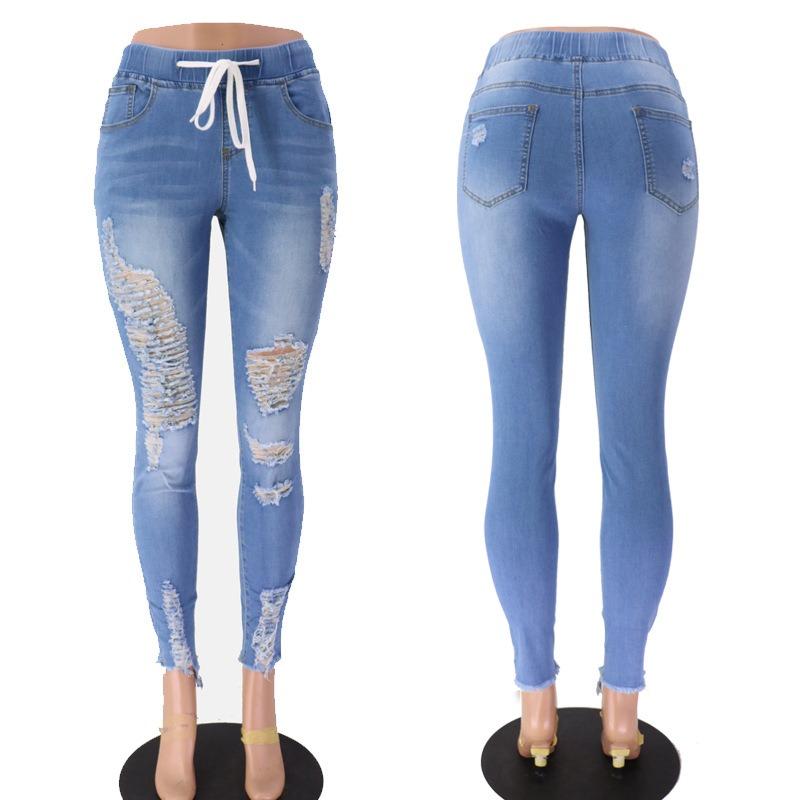Jeans skinny con elastico in vita, vita media, strappati, allacciati in pizzo per donna