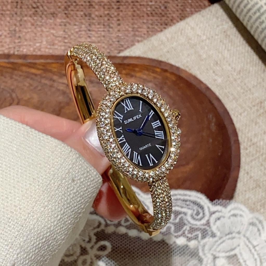 Sunlifex Diamantbesetzte ovale Zifferblatt Armbanduhr für Damen Quarzarmband Berühmte Marke Damenarmbanduhren Saati Relojes