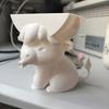 Cow-shaped sponge holder drains water via mouth. Cute sink organizer for kitchen & bathroom; sponge excluded.