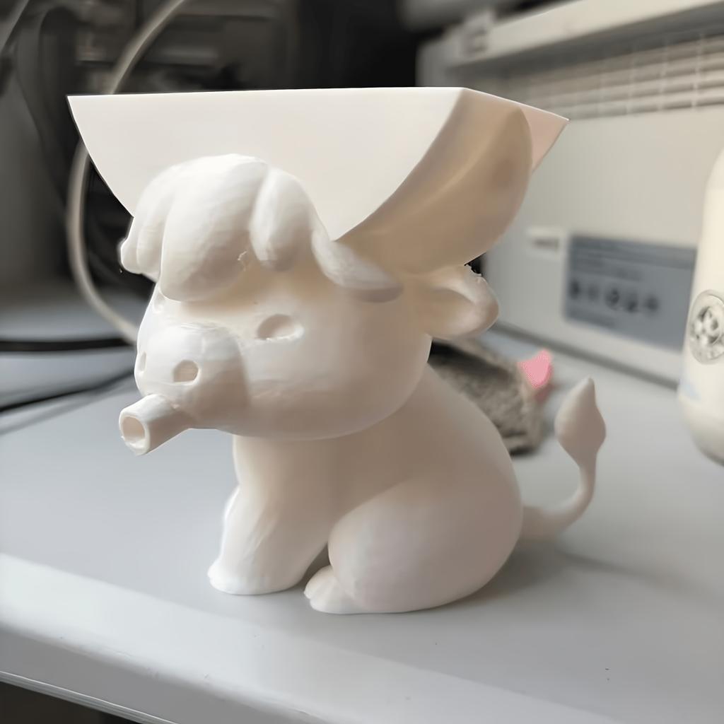 Cow-shaped sponge holder drains water via mouth. Cute sink organizer for kitchen & bathroom; sponge excluded.