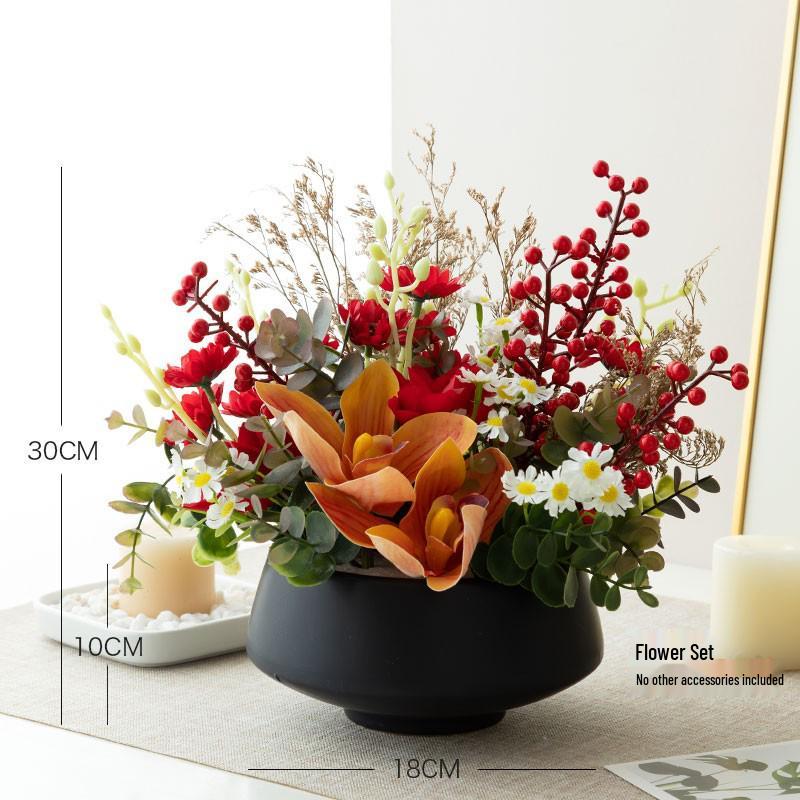Nordisk modern sommarfräsch inomhuskonstgjord blombukett med gröna krukväxter