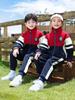 Herbst Kindergartenschule & Grundschule Rotes Uniformset für Sport und Aufführungen