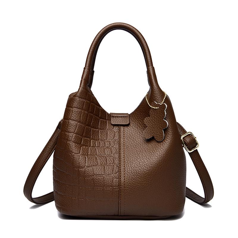 2025 High-End Genuine Leather Women's Shopping Basket Bag with Double-Sided Texture and Leather Tag.
