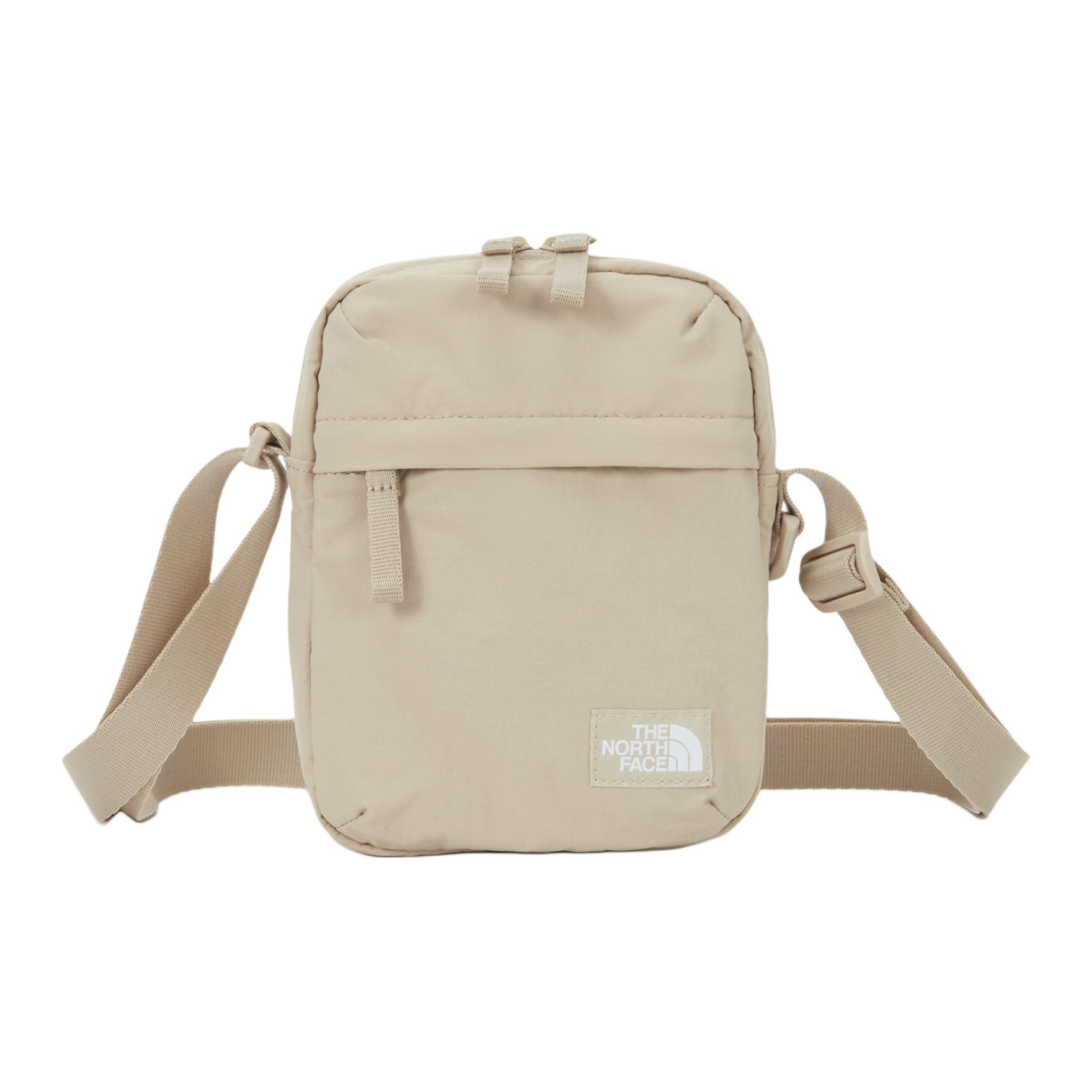 

The North Face Travel 1.3L Zipper Closure Front Logo Backpack Outdoor Bag Unisex backpack Light-Beige NN2PQ66B Light Beige