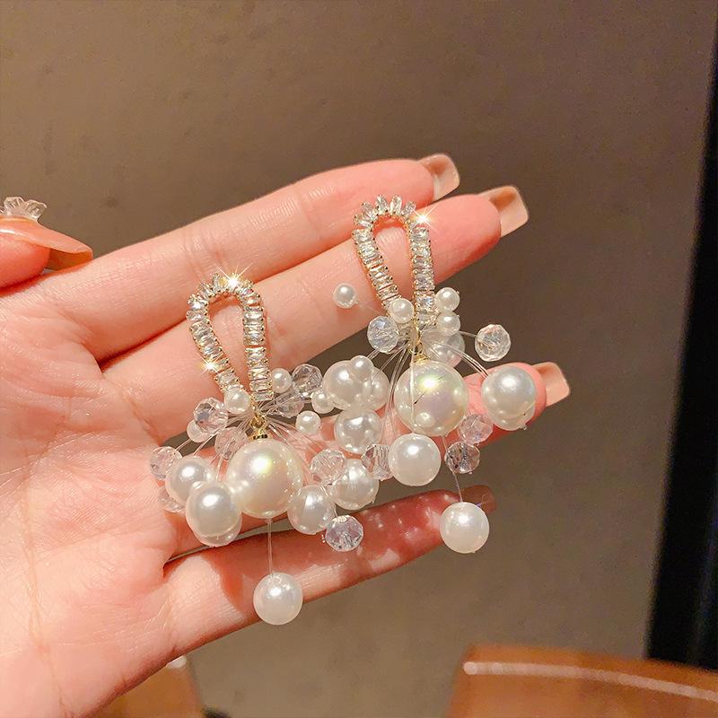 

Изысканные минималистичные серьги-кисточки с жемчугом и кристаллами - Роскошный нишевый дизайн для женщин