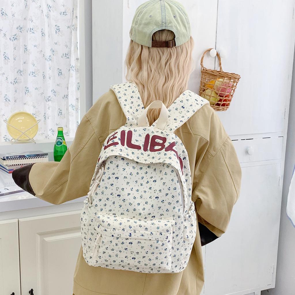Schoolbag schoolbag female junior high school student high school student campus large capacity double shoulder floral letter ins style high niche
