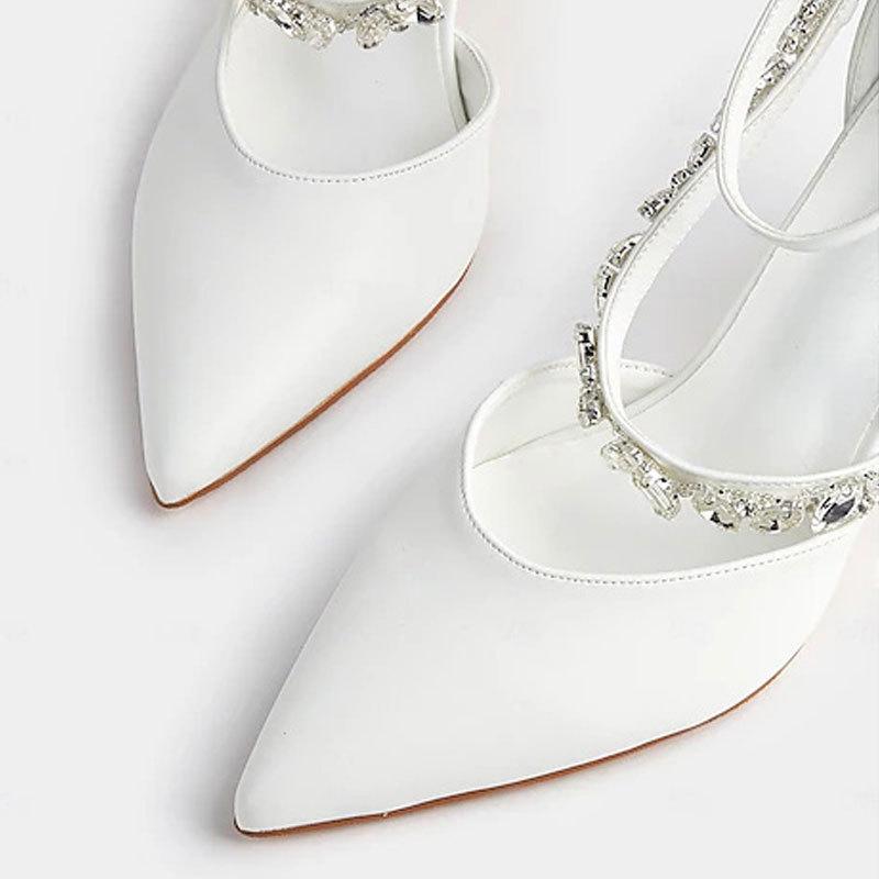 Spring and summer new European and American pointed high heels women's elegant rhinestone thick heel hollow one-word buckle strap shallow wristband s