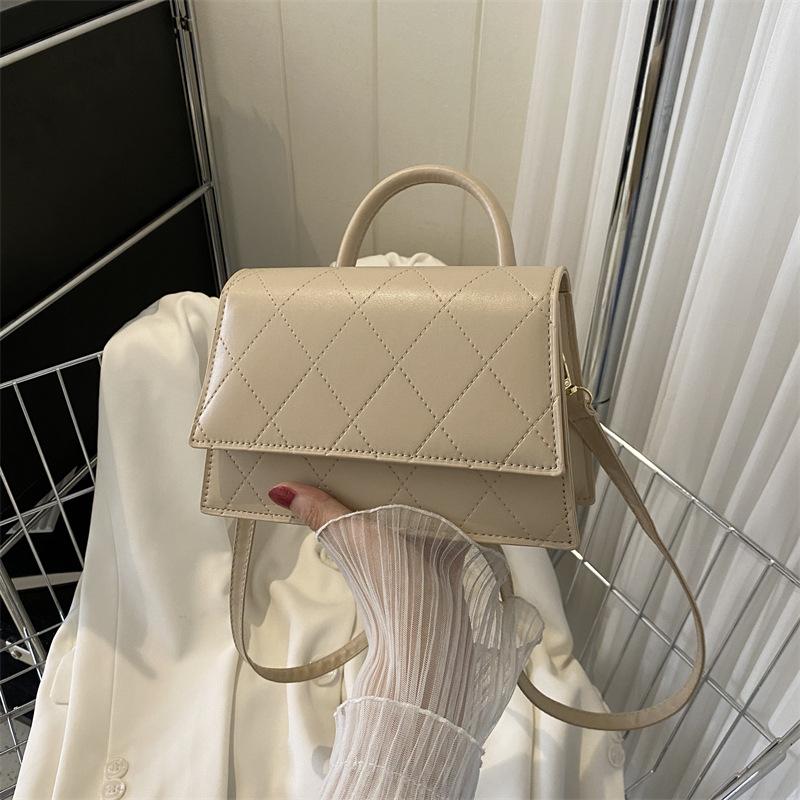 

This year s popular bags women s bags 2024 summer new solid color diamond handbags versatile shoulder messenger bags хакі