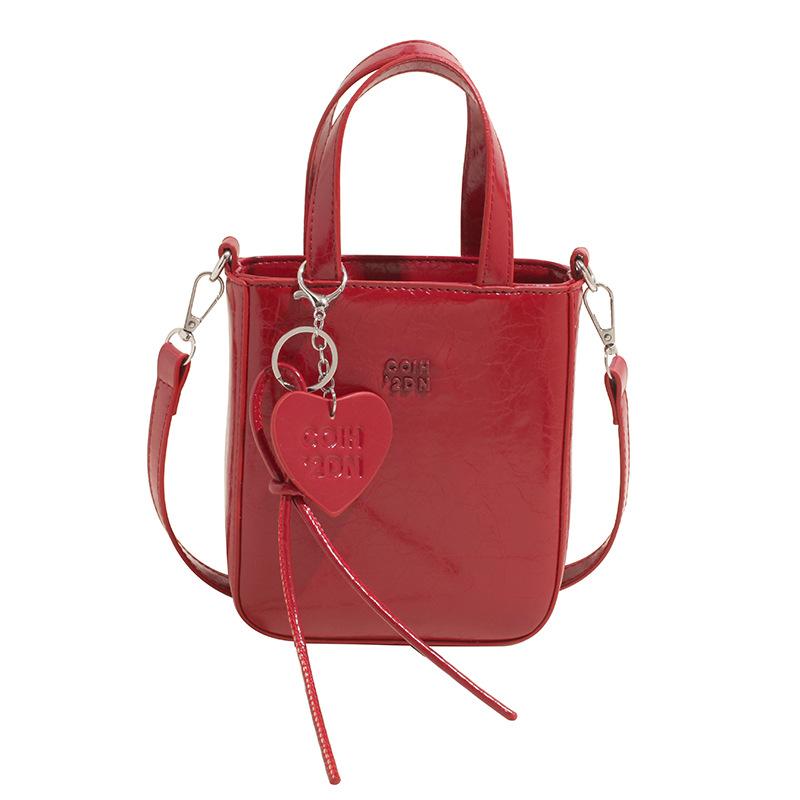 

Popular Korean version of simple style ins solid color mobile phone bag fashionable versatile commuter advanced sense messenger women s bag красный