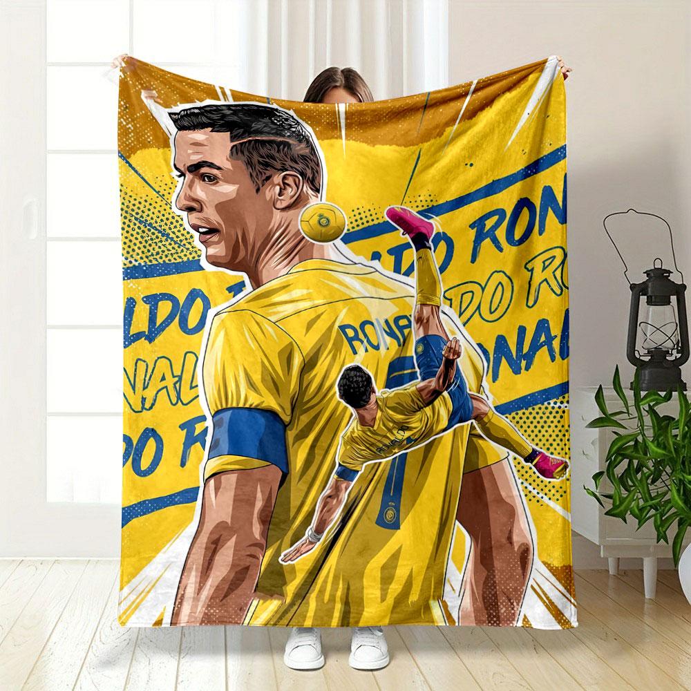 A dynamic soccer-themed illustration with bold yellow and blue colors. for all seasons blanket lunch break throw gift
