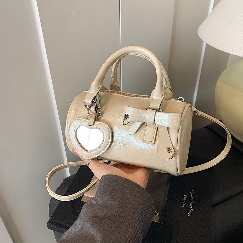 Roztomilá válcová taška dámská 2025 nová móda přenosná růžová taška polštář jednoduchá přes rameno messenger dámská taška