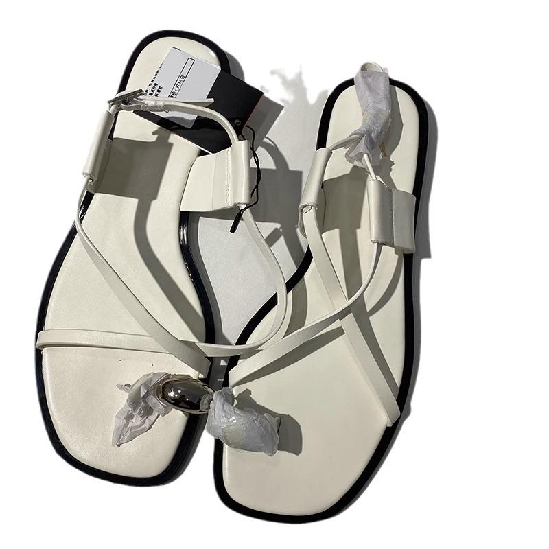 Flat-soled sandals women's fashion versatile one-word strap metal sleeve toe beach vacation sandals