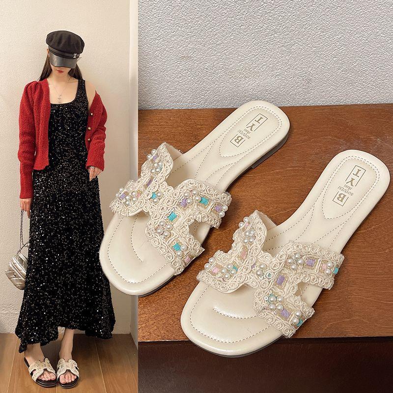 Flat bottom Internet celebrity cool slippers women wear 2025 new summer fairy wind pearl rhinestone word with beach slippers