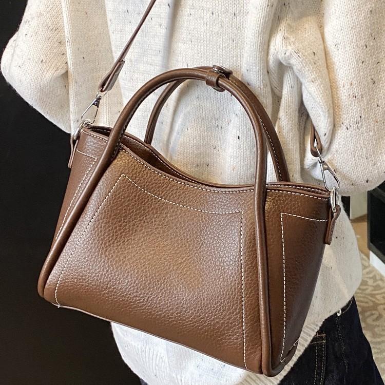 Retro Simple Hand-Carried Bucket Bag Women'S Spring New Niche High-End Shoulder Bag Casual Commuting Versatile Women'S Bag