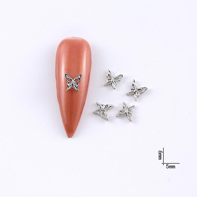 

10Pcs Simplicity Mini Hollow Butterfly Nail Art Charms Metal Butterfly Nail Art Decoration Diy Nail Manicure Accessories as the picture