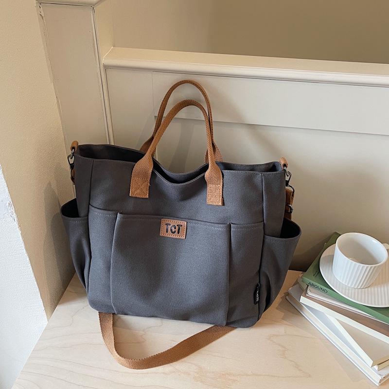 2026 Women's Large Capacity Canvas Tote: Versatile, Fashionable Handheld Shoulder Bag for Commuting