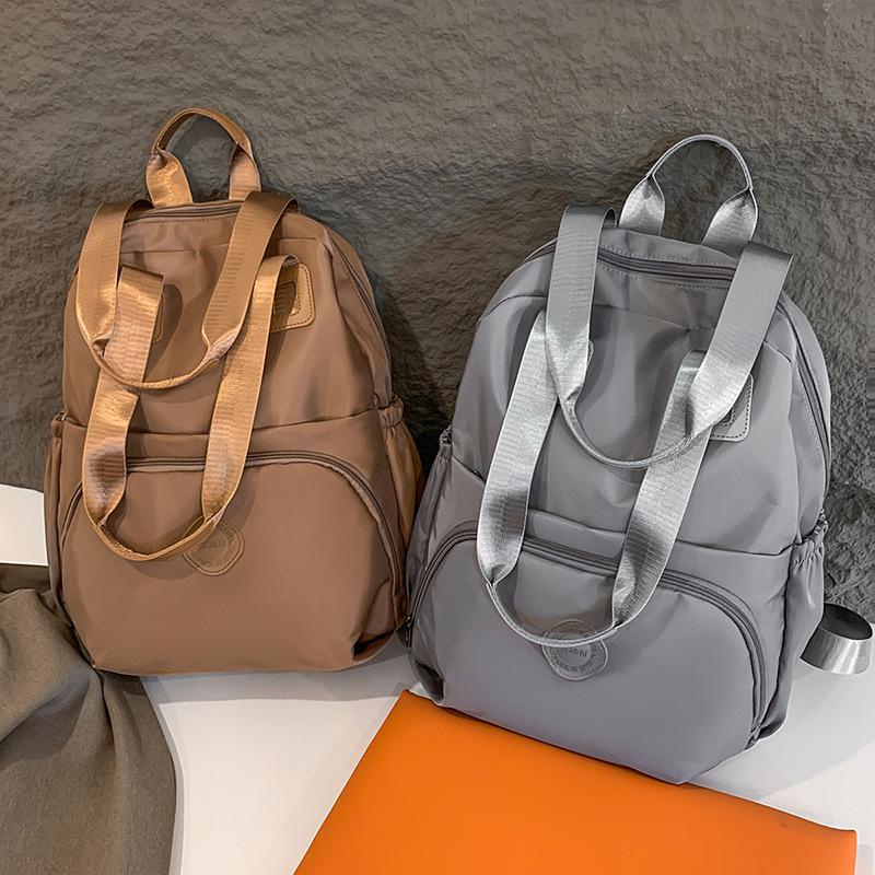 Schoolbag New Large-capacity Backpack Korean Version of Leisure Travel Simple and Versatile Shoulder Bag Women's Bag Multi-functional Tote Bag