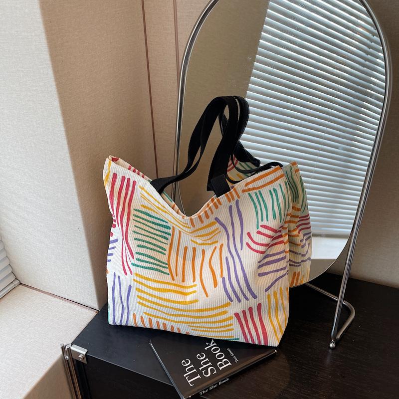 

Trend class personalized shoulder bag simple 2025 summer new women s bag student handbag tote bag різнокольоровий