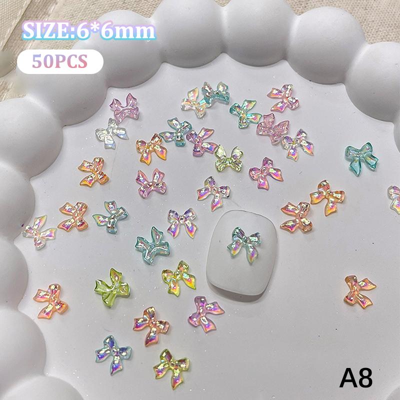 

50Pcs Colorful Bow Nail Art Accessory Illusionary Ab Color Resin Ribbon Bows Manicures Decoration Charm as the picture
