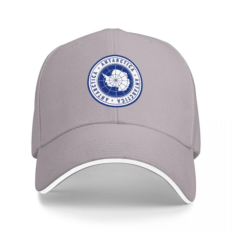 Antarctica Logo Baseball Cap Black Adjustable Hat with White Trim and Blue Circular Emblem Featuring Polar Design and Text