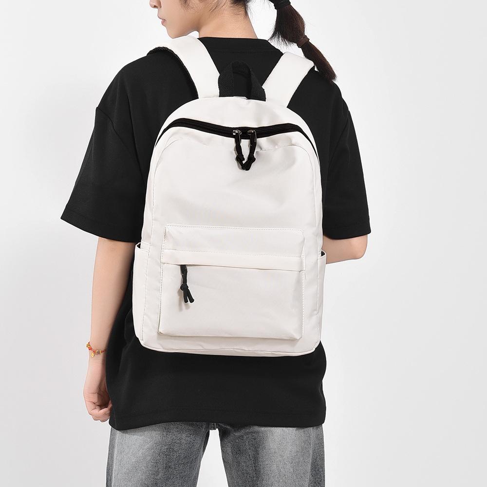 Solid color backpack fashion trend men's and women's backpack simple large capacity backpack student schoolbag casual backpack