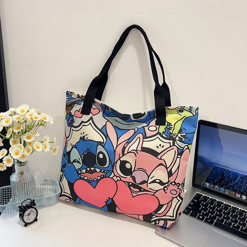 High-value canvas bag large-capacity cute cartoon interstellar baby student clothing book shoulder bag portable shopping bag female