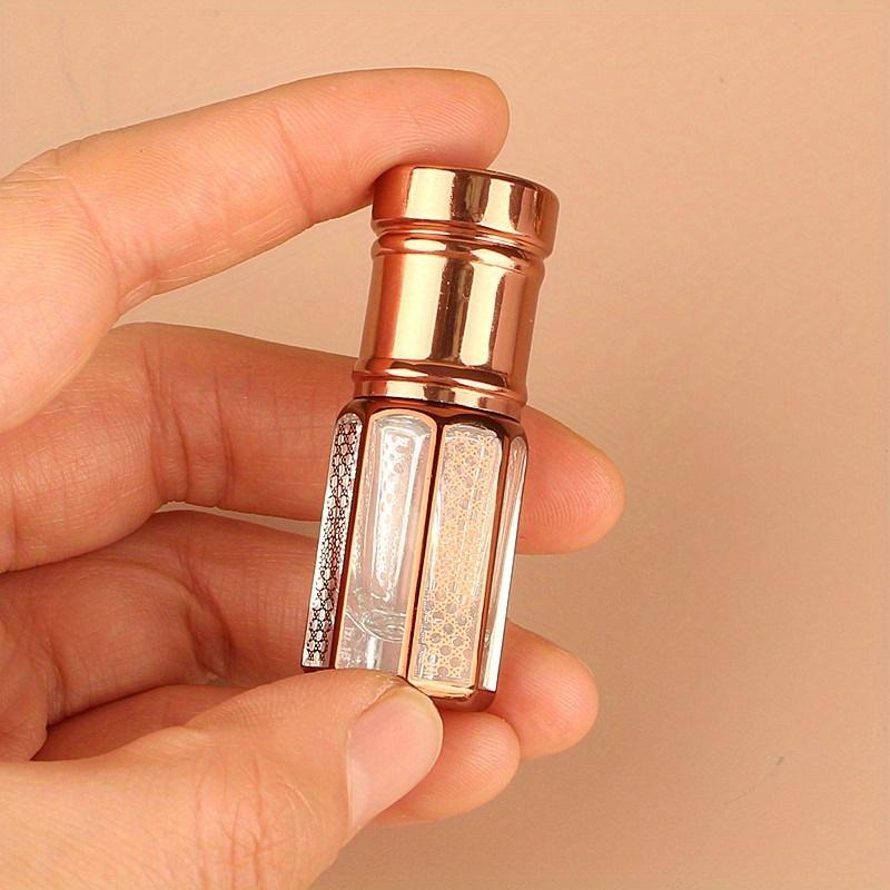 12ml luxusní zlatá válečková lahvička na esenciální olej Plnitelná lahvička na parfémy Skleněná lahvička na esenciální olej s navíjecí kuličkou Nádobka na kosmetiku
