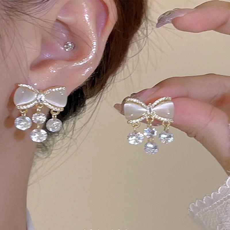 Annual explosion Pearl butterfly earrings women's high-end sense niche 925 silver needle earrings ear jewelry wholesale