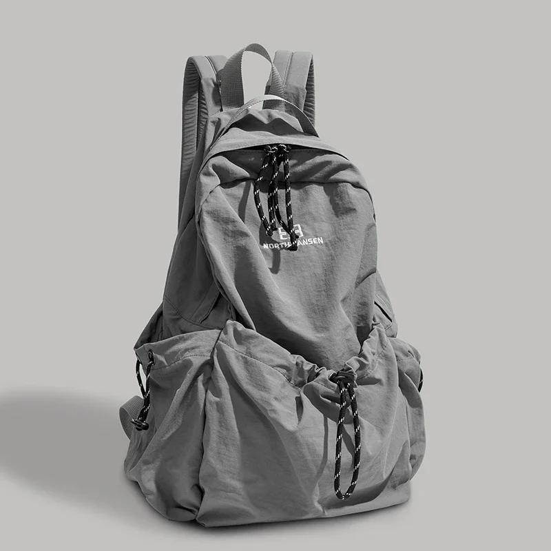 Solid Nylon Large Capacity Backpack 2026 Hot Selling Air Cushion Strap Soft Casual Backpack Soft Handle Outer Frame School Bags