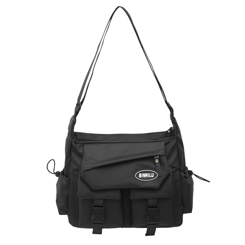 

Crossbody bag men s and women s trendy brand tooling casual student mailman bag shoulder bag class commuter backpack чорний