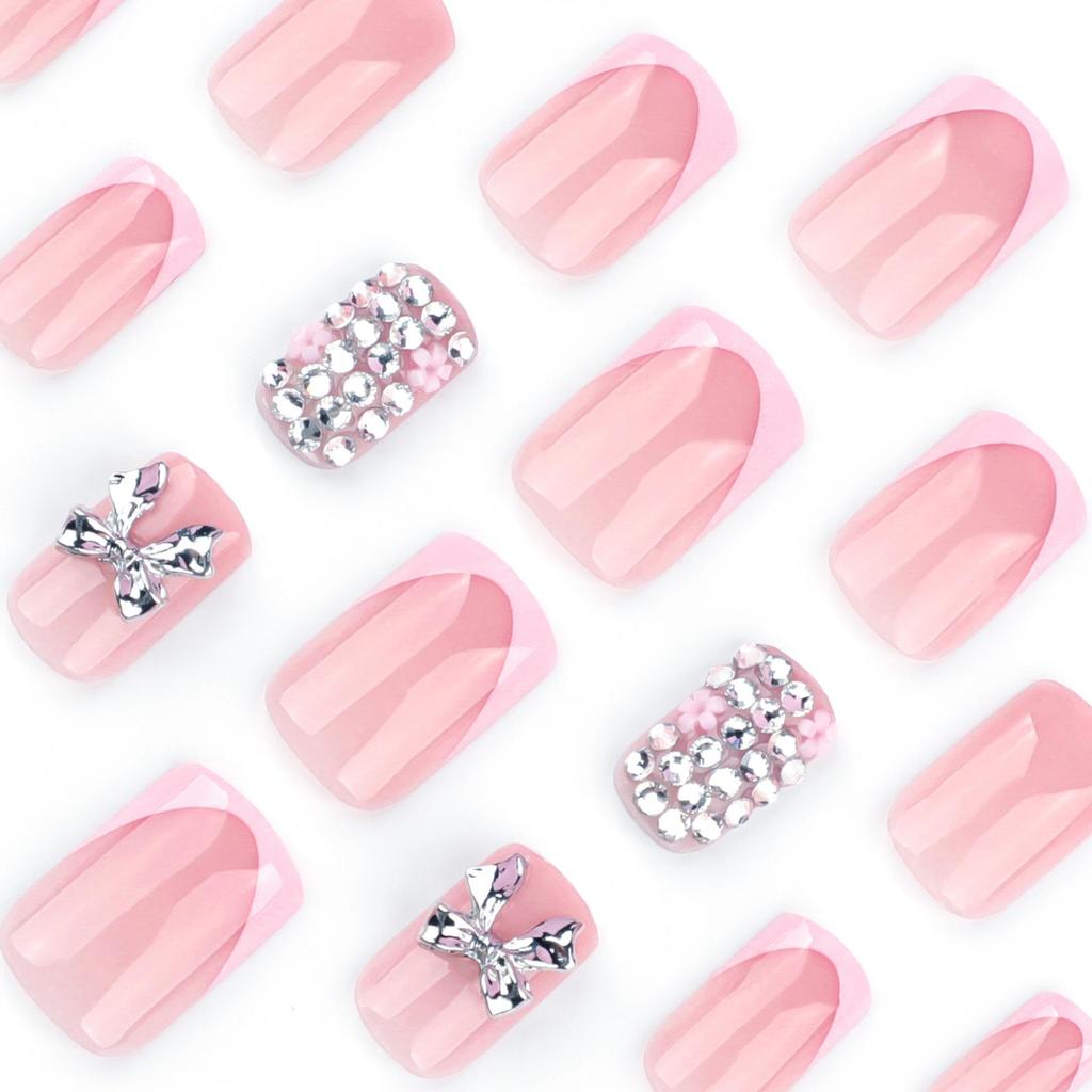 Short Square French Pink False Nails with 3D Metal Bow and Glitter Sparkle Nail Art.