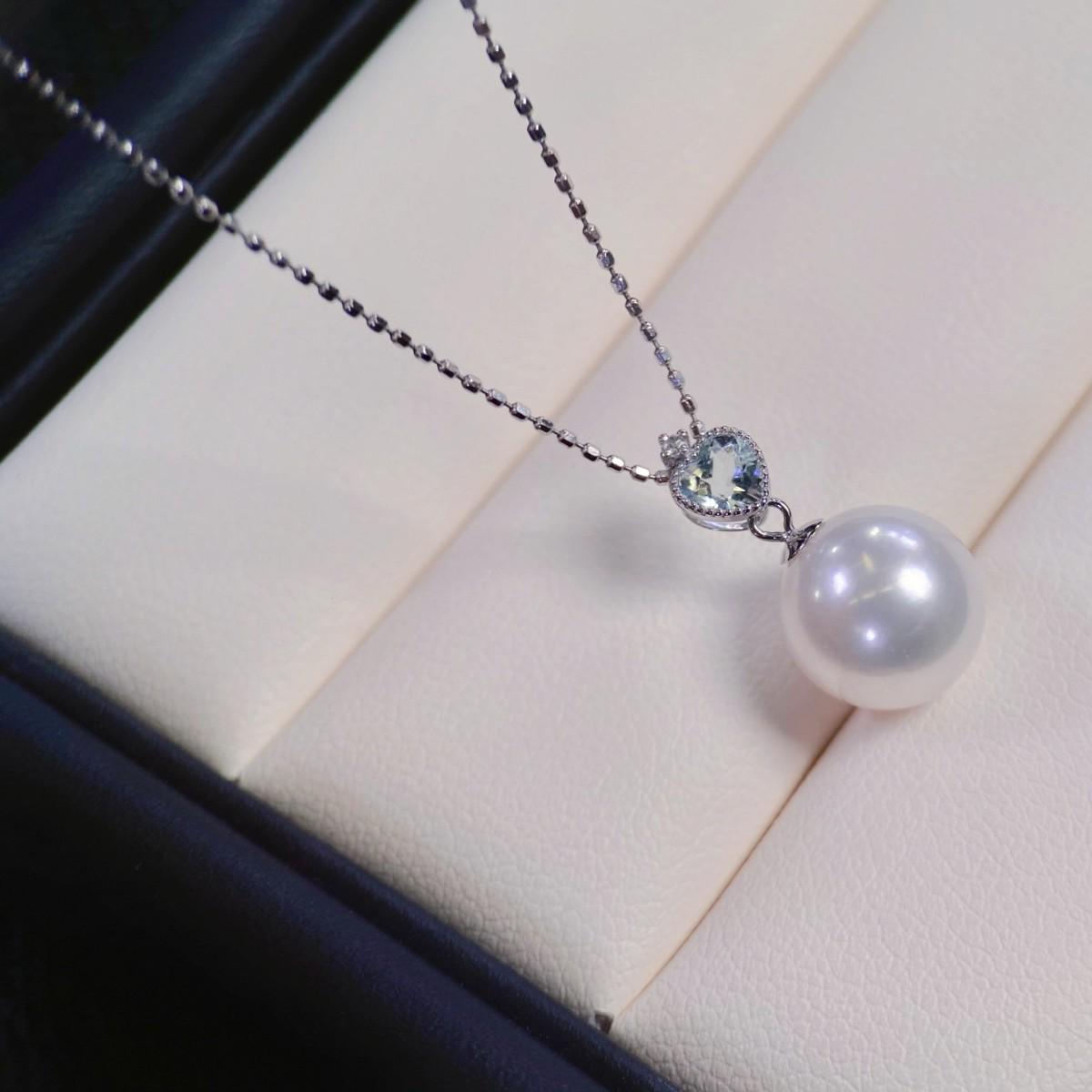 

Platinum Pt900 Aquamarine Pendant with 9-10mm Bead, 0.2ct Aquamarine, 0.01ct Diamond (Chain Not Included). Pt900