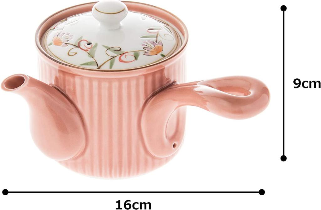 This lightweight teapot features a hand-painted floral lid, a 9cm diameter, and a 350ml capacity. Its delicate pink design features a long,
