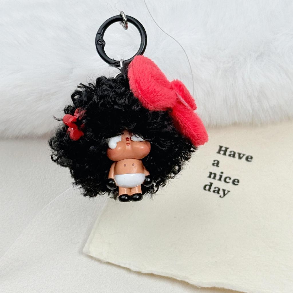 Crying Doll Keychain with Wig & Bow - Creative Cartoon Pendant for Bags & Phones