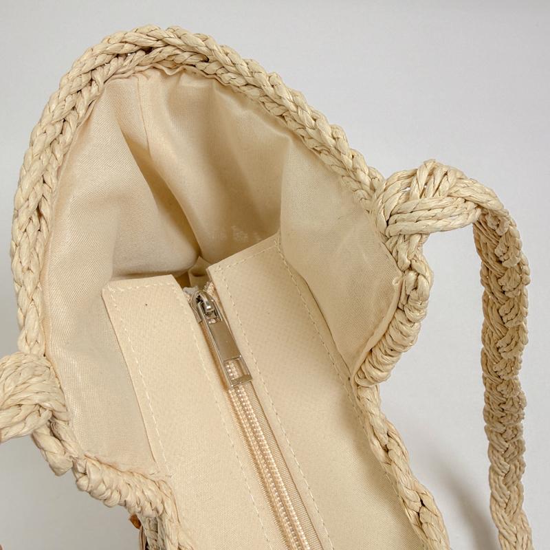Handwoven Natural Fiber Tote Bag with Braided Handles and Open Weave Design