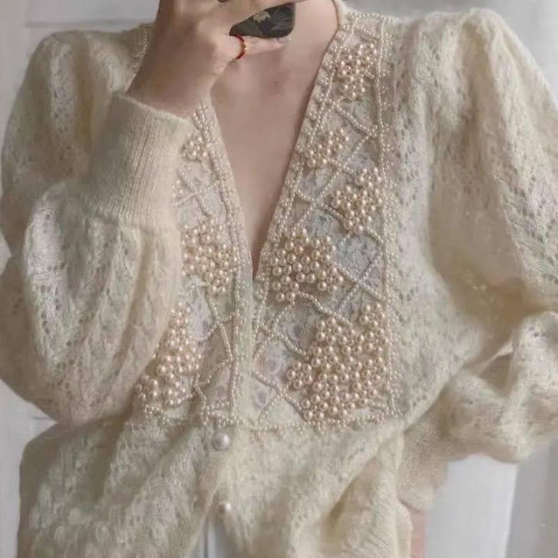 

Элегантный кардиган с ажурной вязкой и жемчужной инкрустацией - Весенняя коллекция для женщин One size грязно-белый