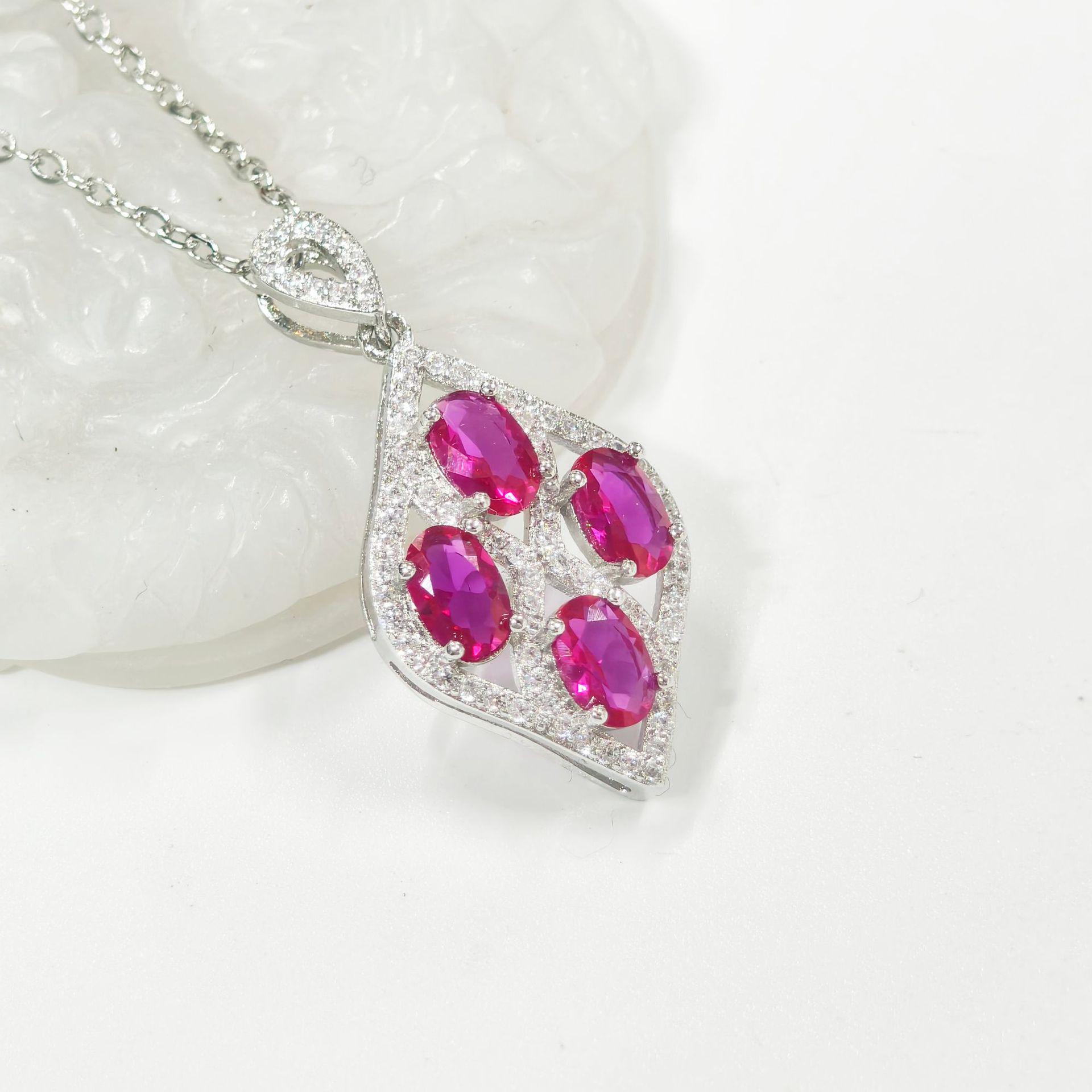 Gesen Luxury Women s Three-Piece Set: Versatile Ring, Earring, Pendant with Leaf Design and Multi-diamond Accents.