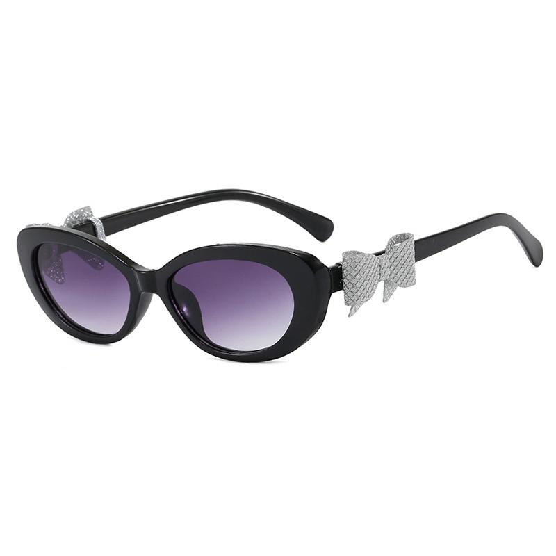 Fashion cat eye sunglasses bow decorative sunglasses women's high-end street photo UV-proof sunglasses