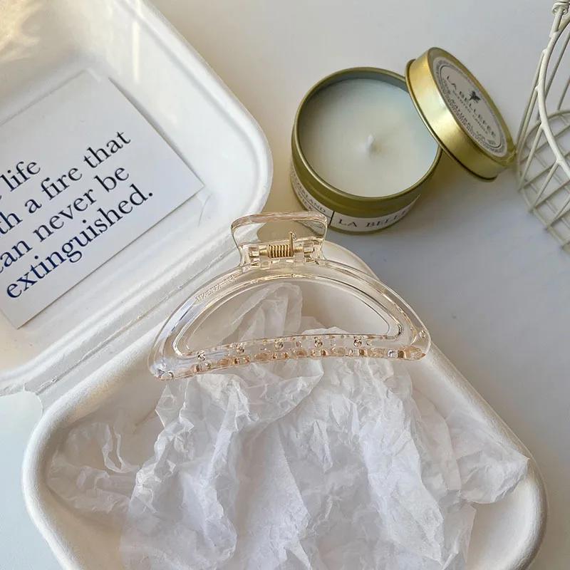 Nouvelle pince élégante en acrylique à grande griffe pour femmes Ins Mode simple Rétro Pince à cheveux creuse en forme d'éventail Accessoires pour cheveux pour filles