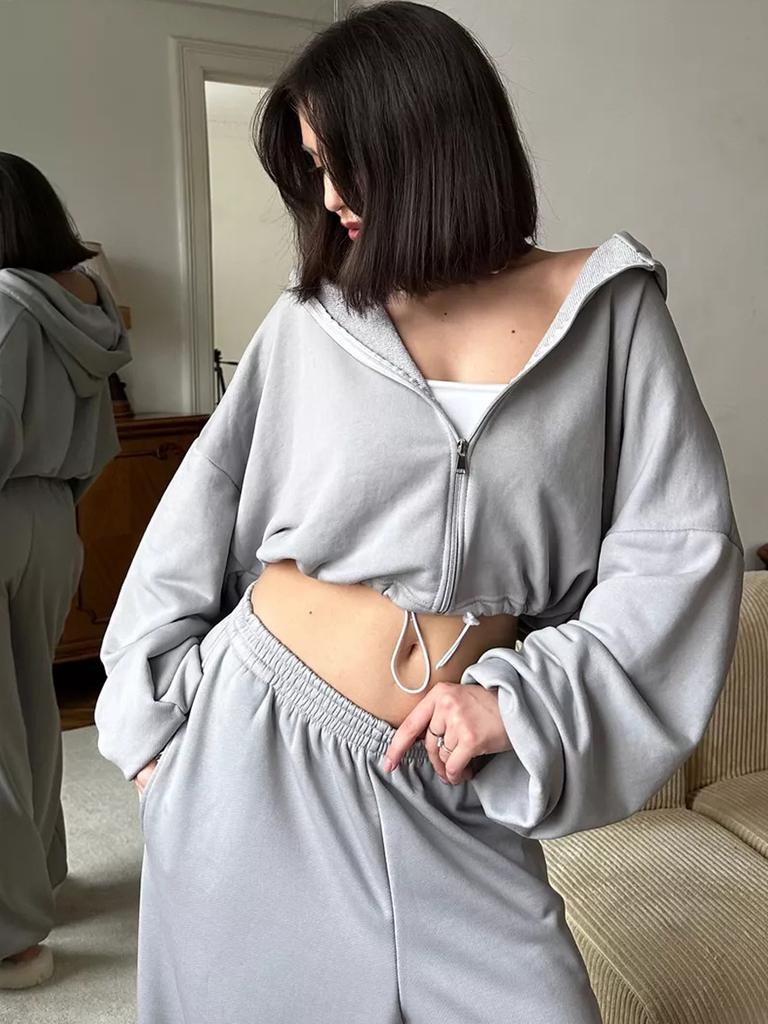 European and American women's casual suit solid color long-sleeved zipper cardigan drawstring hooded sweater sports elastic pants two-piece set