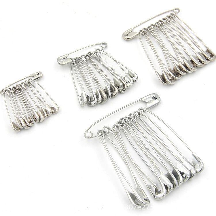 Vintage Metal Safety Pin Brooch for Securing Clothing and Tags