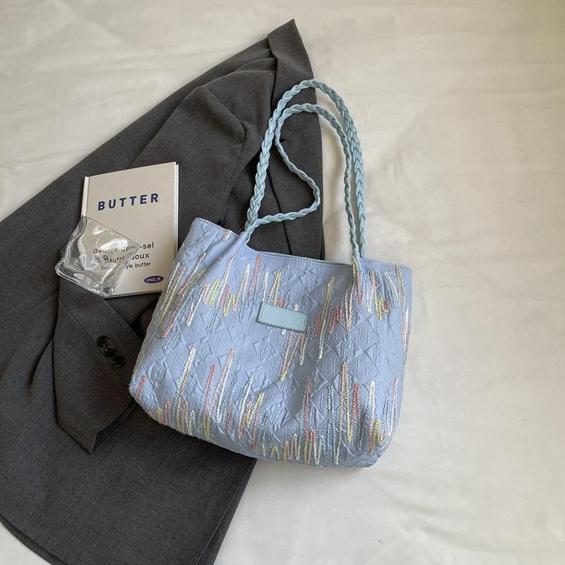 

Canvas bag women s large capacity 2025 new summer college student commuting tote bag casual versatile shoulder women s bag