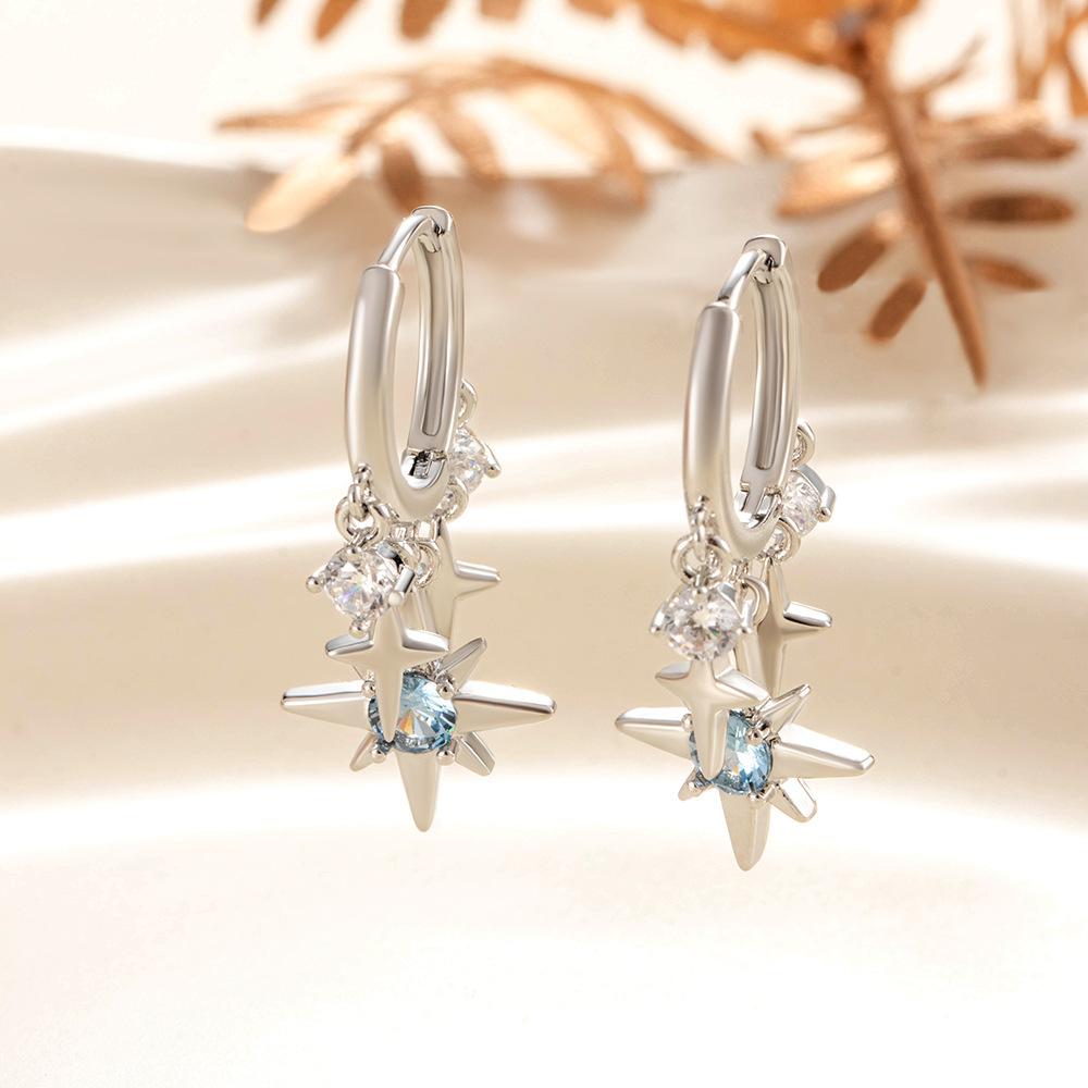 Sweet and cool wind super flash blue diamond four-pointed star fringed ear buckle niche design sense exquisite fashion temperament versatile ear