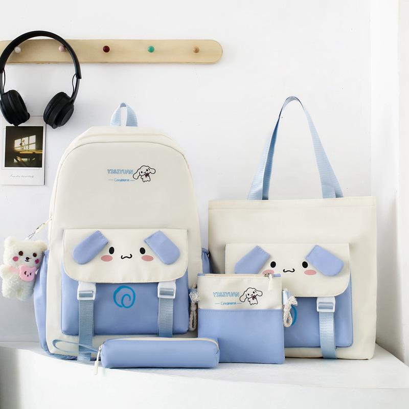 School bag new cartoon cute primary school schoolbag four-piece large-capacity middle school student backpack burden reduction casual backpack women